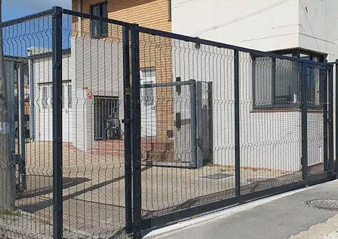 Black mesh fencing panel and gate