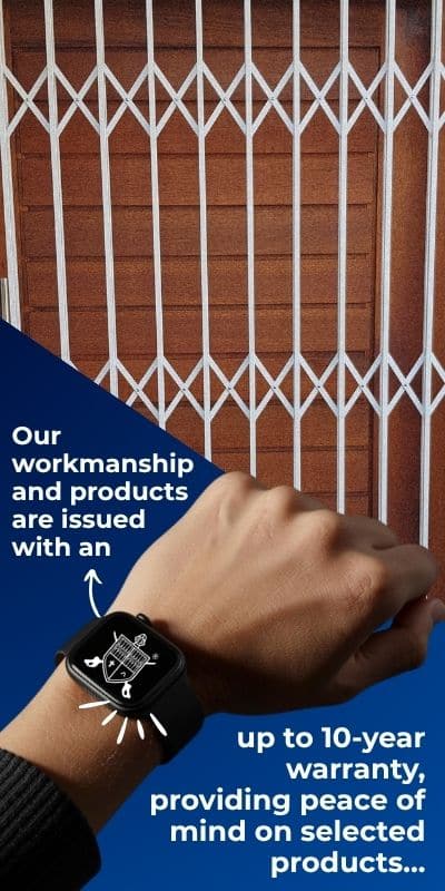 Wrist with branded warranty badge in front of security gate
